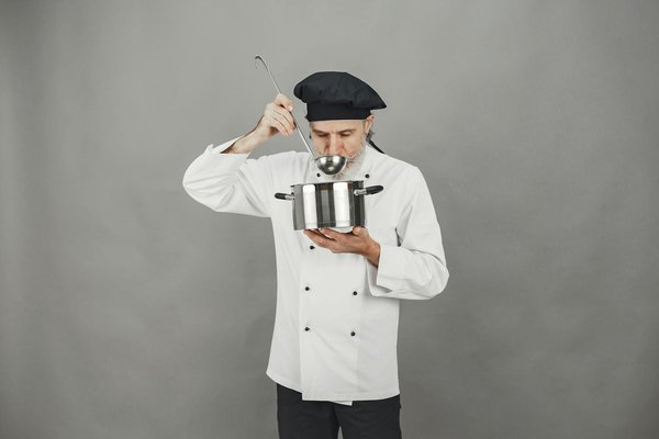 How are UK kitchen designers addressing the need for energy efficiency?